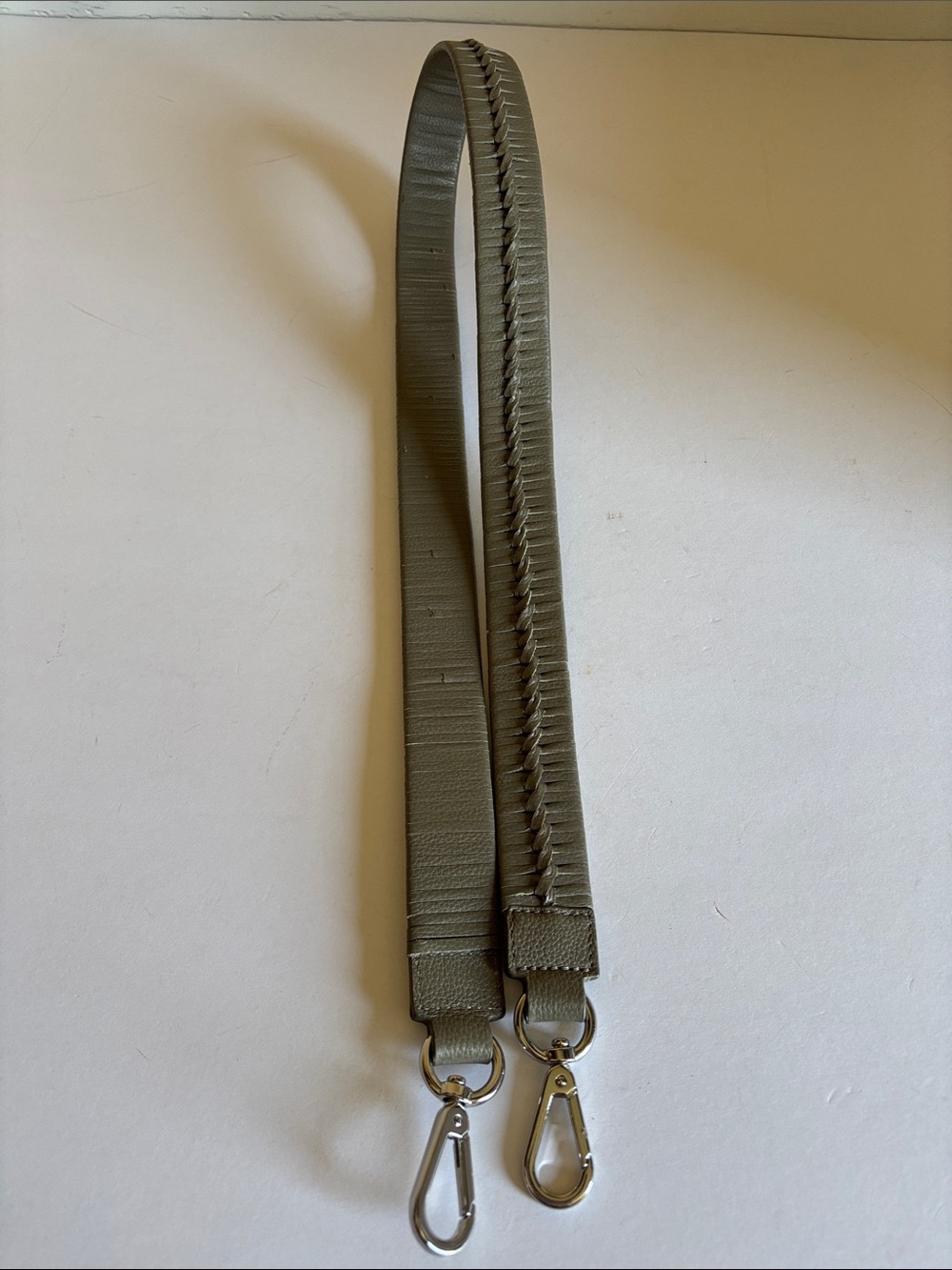 Bag replacement strap